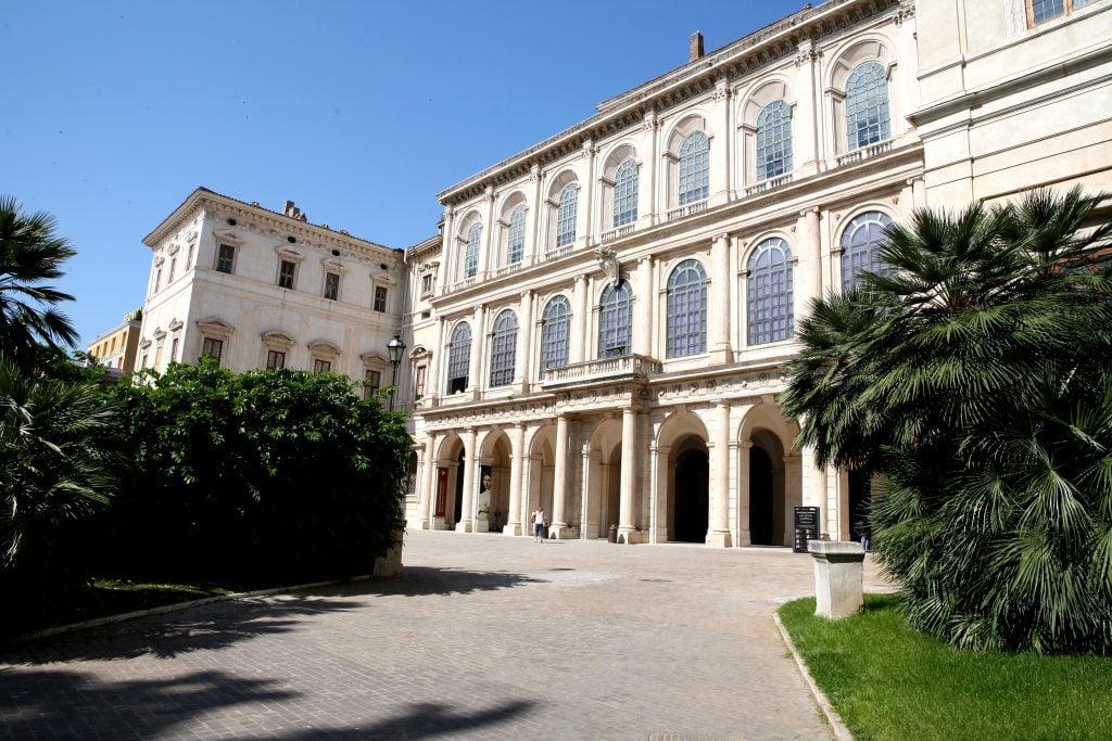 outside of an Italian building from a courtyard