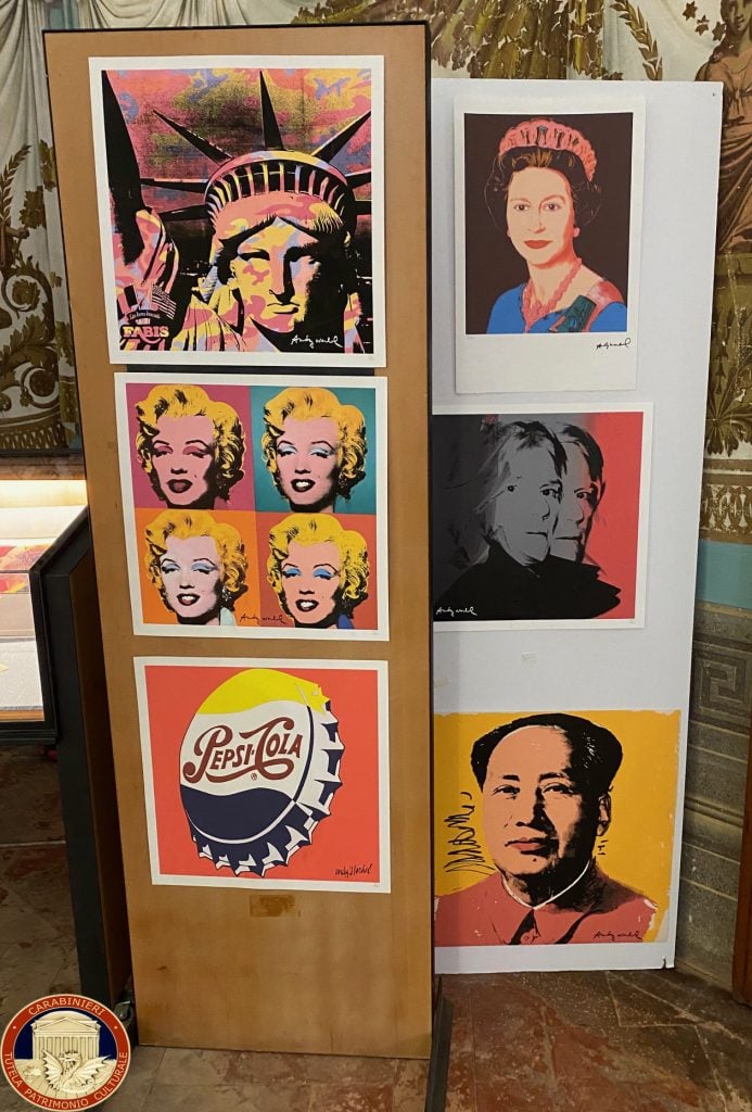 two rows that include forged artwork by Andy Warhol