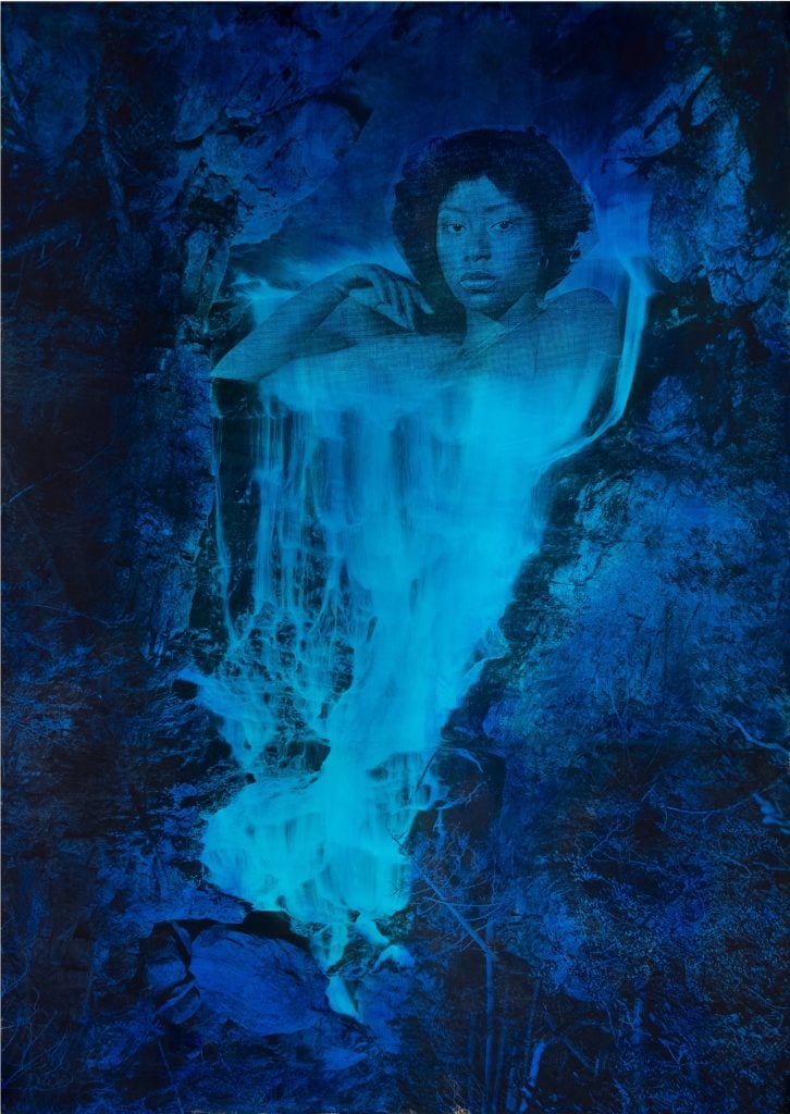 a dark blue painting with a depiction of an ethereal woman in the middle 