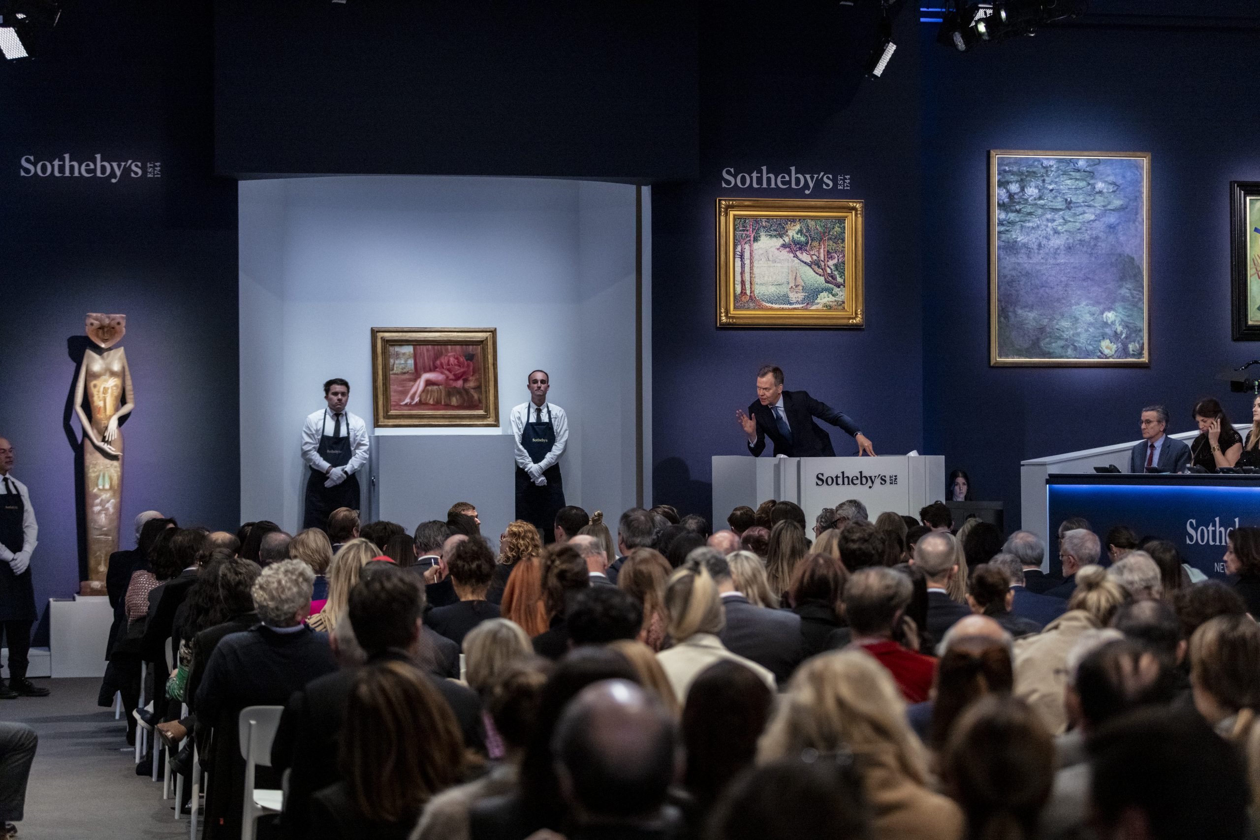 an auctioneer in the auction room at Sotheby's