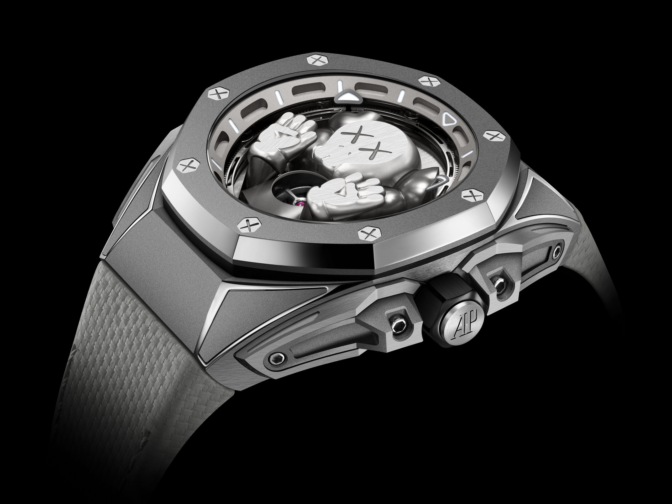 a silver luxury watch is on a black and white background