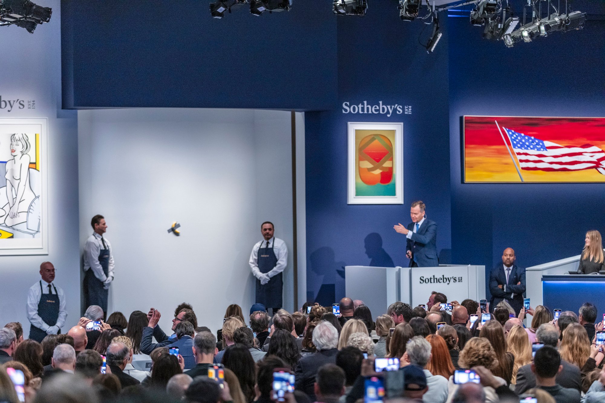 an image of the view of the Sotheby's saleroom where Maurizio Cattelan's banana was sold