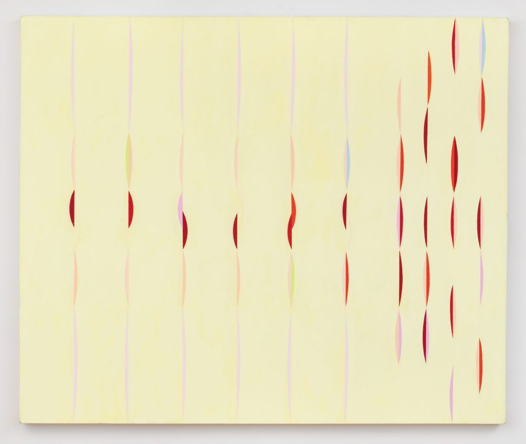 Abstract painting by Audra Skuodas of a field of buttercup yellow with vertical dashed liens with various opacities of red.