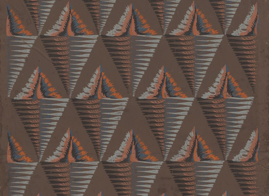 An abstract patterned wallpaper panel made from triangular shapes on a brown ground.