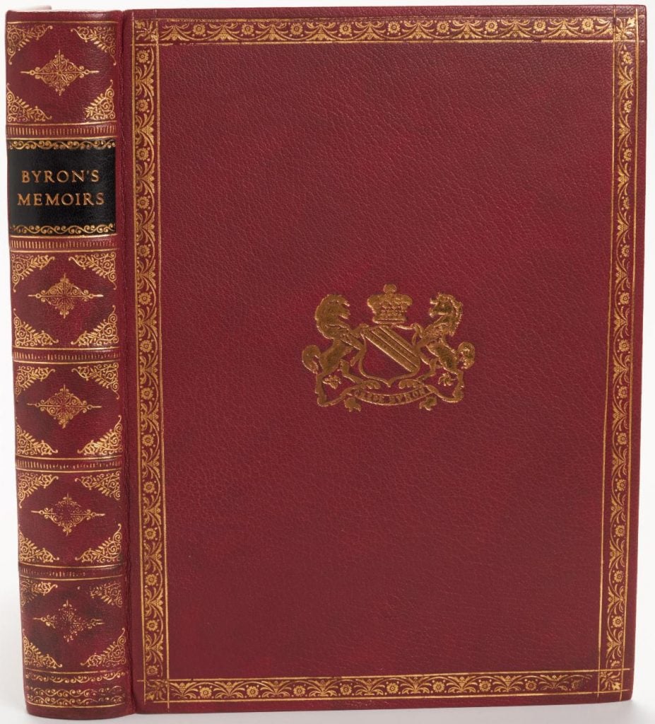 a red spine and cover bok with gold emboss and the tile on the spine reading "Byron Memoirs"