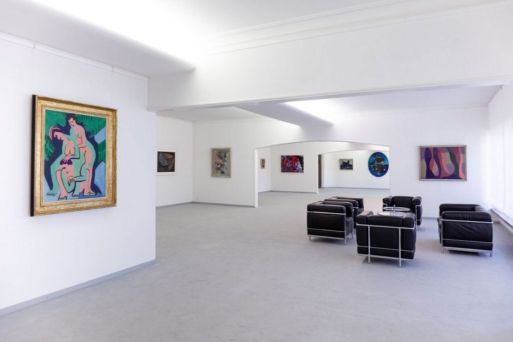 Installation view of "EXPRESSIVE! Expressionist Paintings of the First and Second Generation" (2024). Courtesy of Galerie Henze and Ketterer, Wichtrach / Bern, with a painting by Ernst Ludwig Kirchner in the foreground on the left.