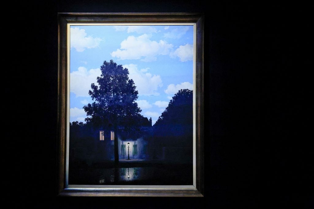 René Magritte's <I>L'empire des lumières</I> is on display during a press preview for Christie's Fall 20/21 Marquee Week in New York City, on November 8, 2024. 