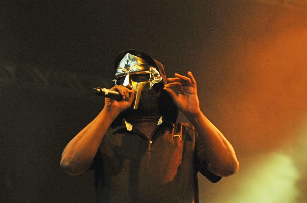 Rapper MF Doom performs at Alexandra Palace in London while wearing a mask