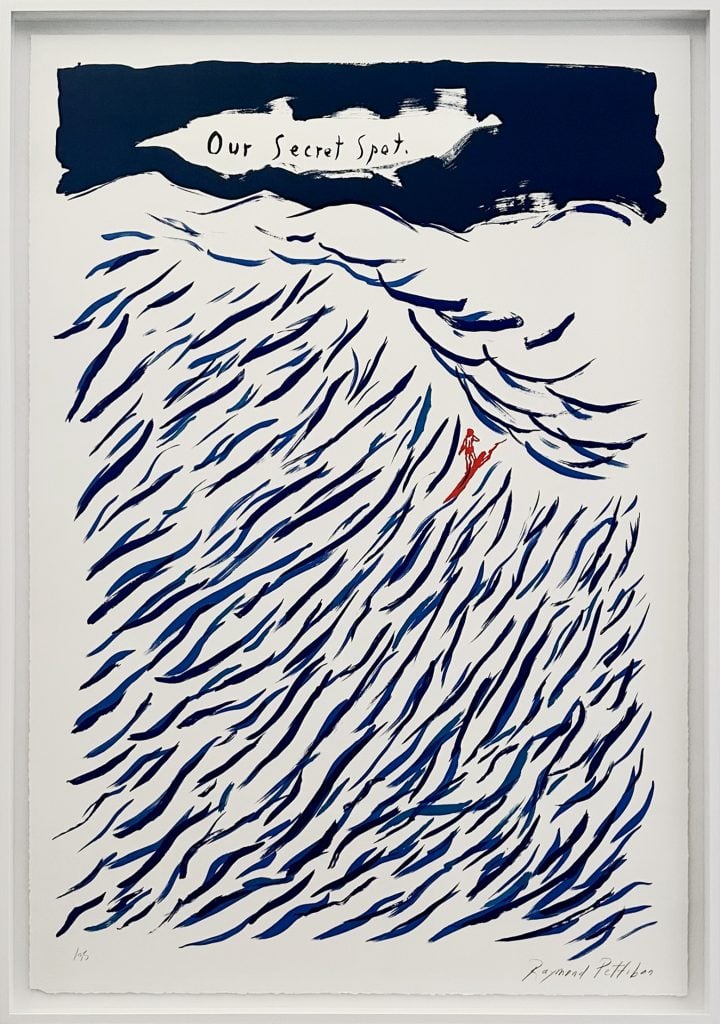 Print by American artist Raymond Pettibon, showing waves as small blue brushstrokes with a small red figure on a surfboard under a blue sky of the same blue color and text in a gap of the hue reading "our secret spot."