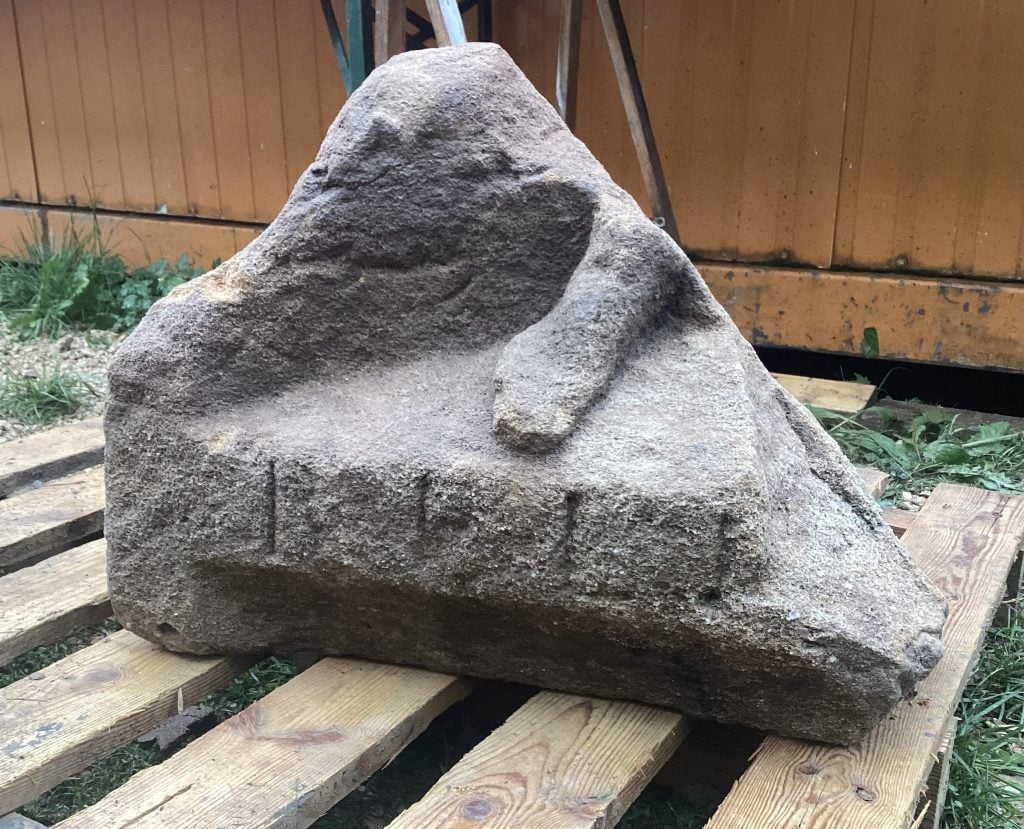 A large fragment of an ancient Roman votive monument