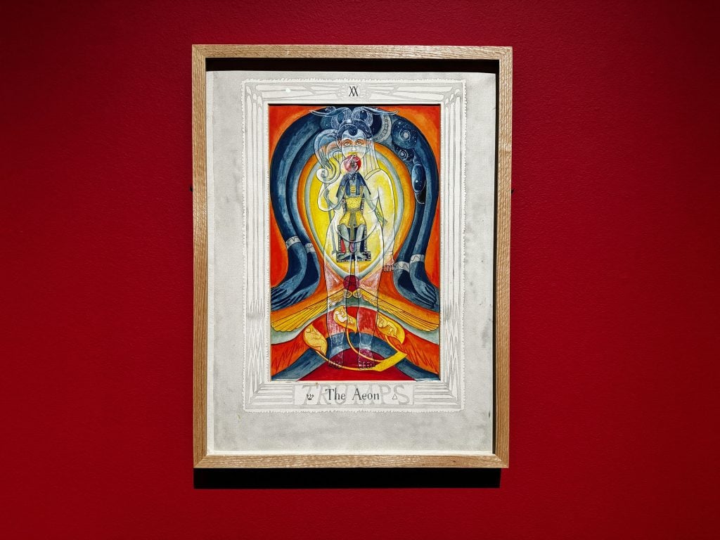 Illustration of The Aeon for Aleister Crowley's tarot deck hanging in a gallery