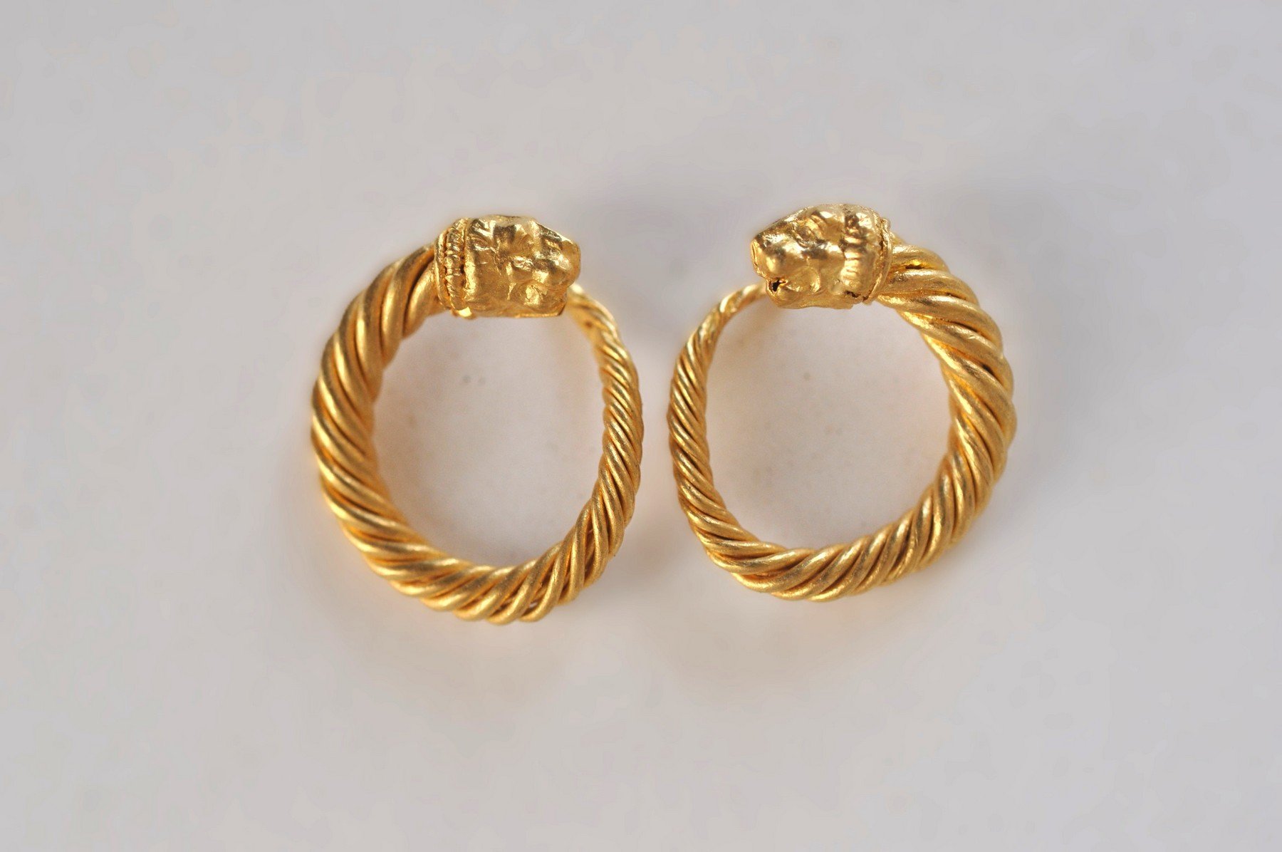 A pair of ancient gold earrings