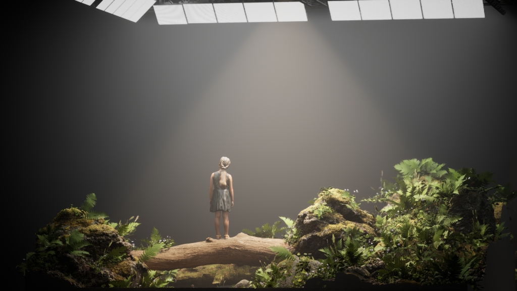 An image of a person standing on what appears to be a downed tree in an empty, skylit space