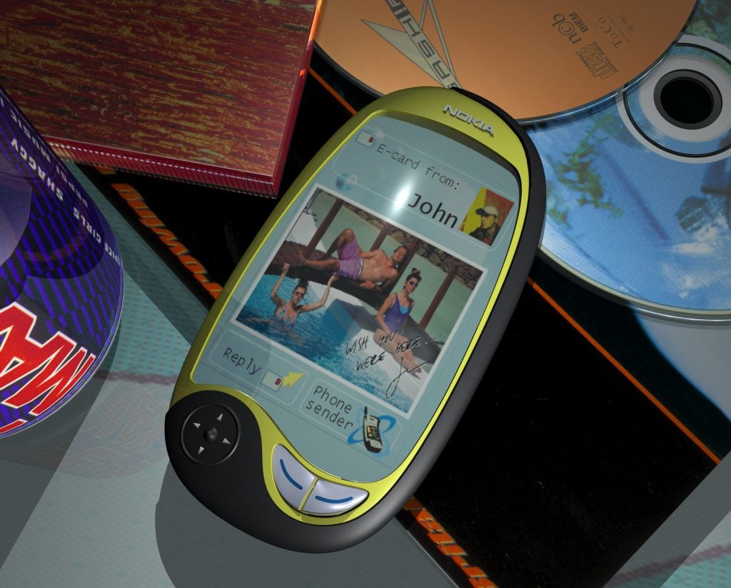 A digital rendering of an egg-shaped cellphone on a crowded desk.