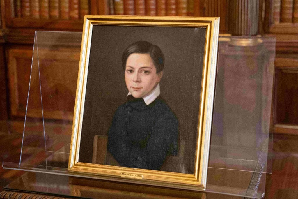 A painting of a young spanish boy in the 1800s