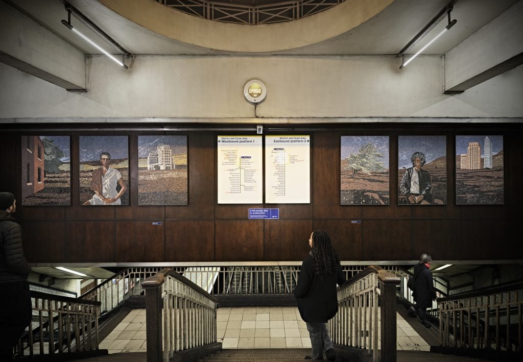 Two murals in a railway station