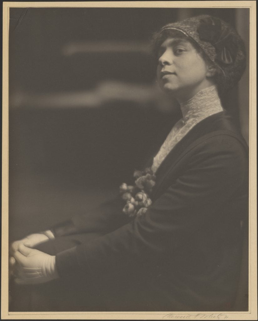 Clarence H. White's black and white portrait of a young Belle da Costa Greene, a light-skinned black woman in a fashionable cloche (1911).