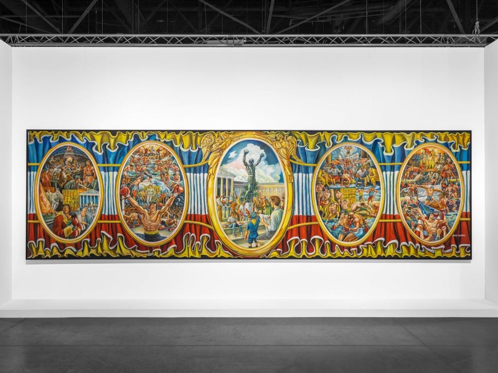 A massive painting with five ovular windows shows a boxer