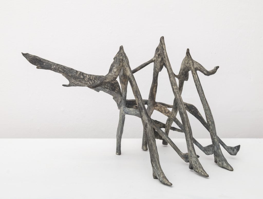 A Helen Evans Ramsaran bronze sculpture, with pointy ridges and leg-like forms.