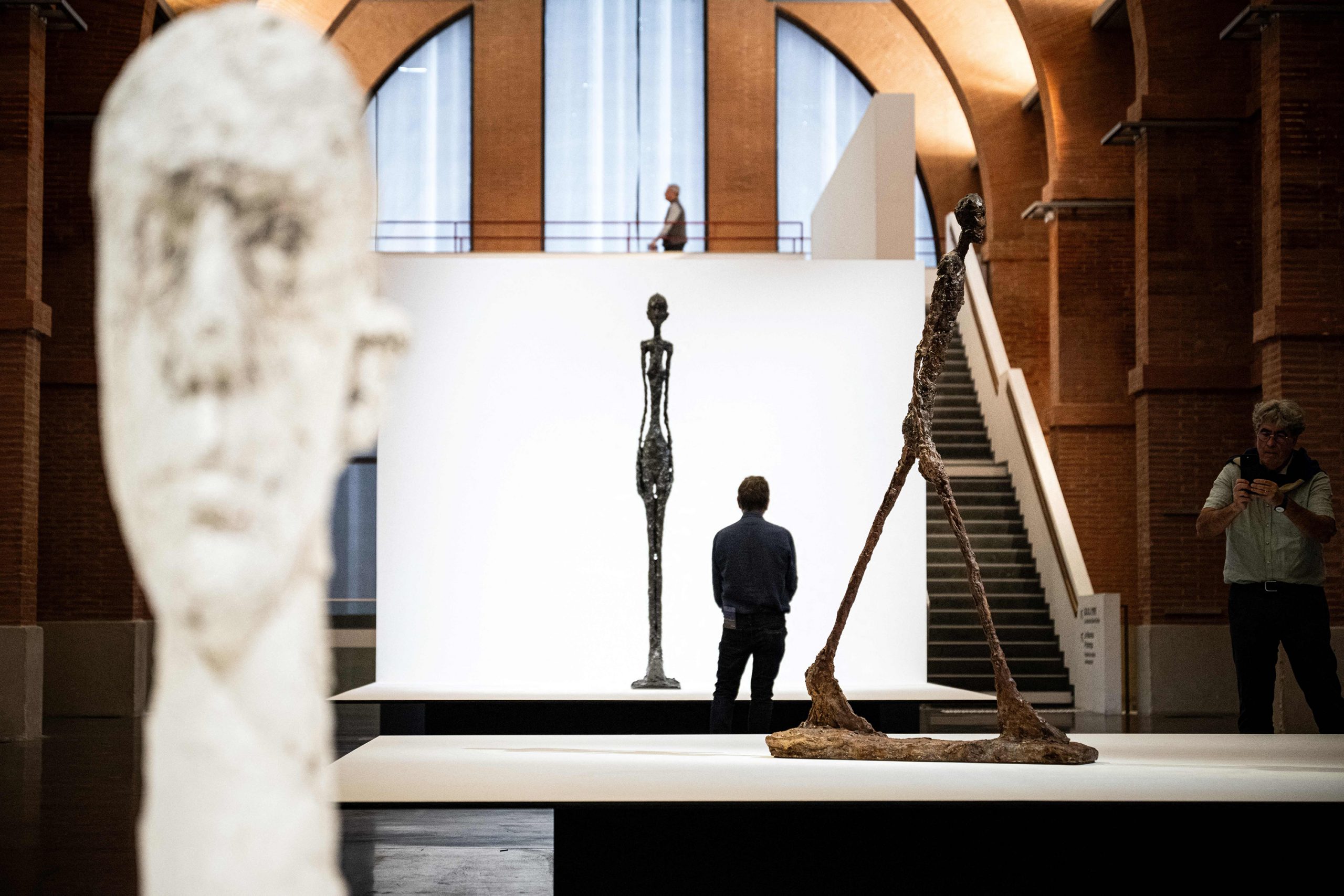 People visit the exhibition dedicated to late Swiss artist Alberto Giacometti on September 22, 2023 at the Abattoirs museum in Toulouse, southwestern France.