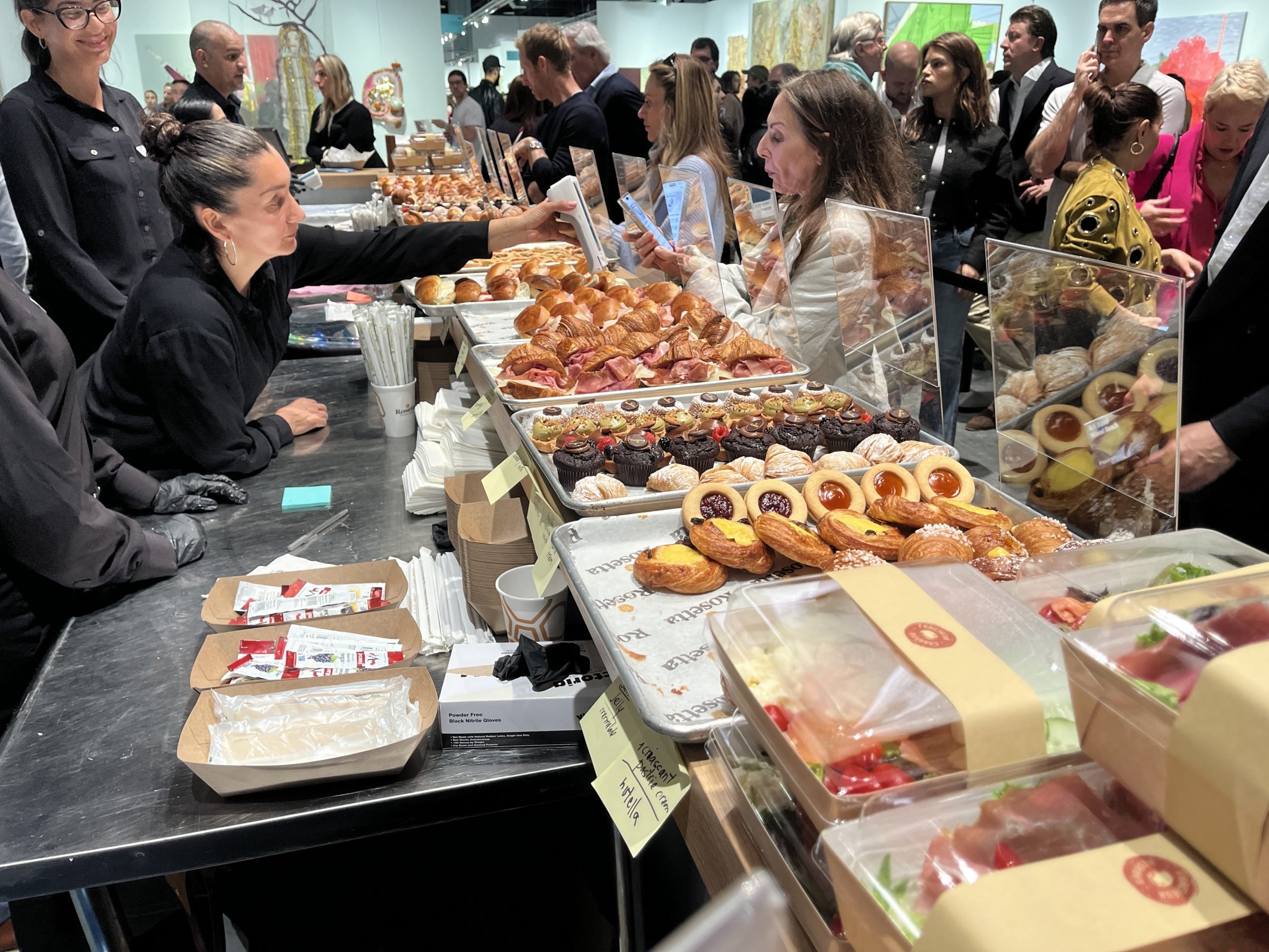 A variety of pastries await eager buyers in this color photo