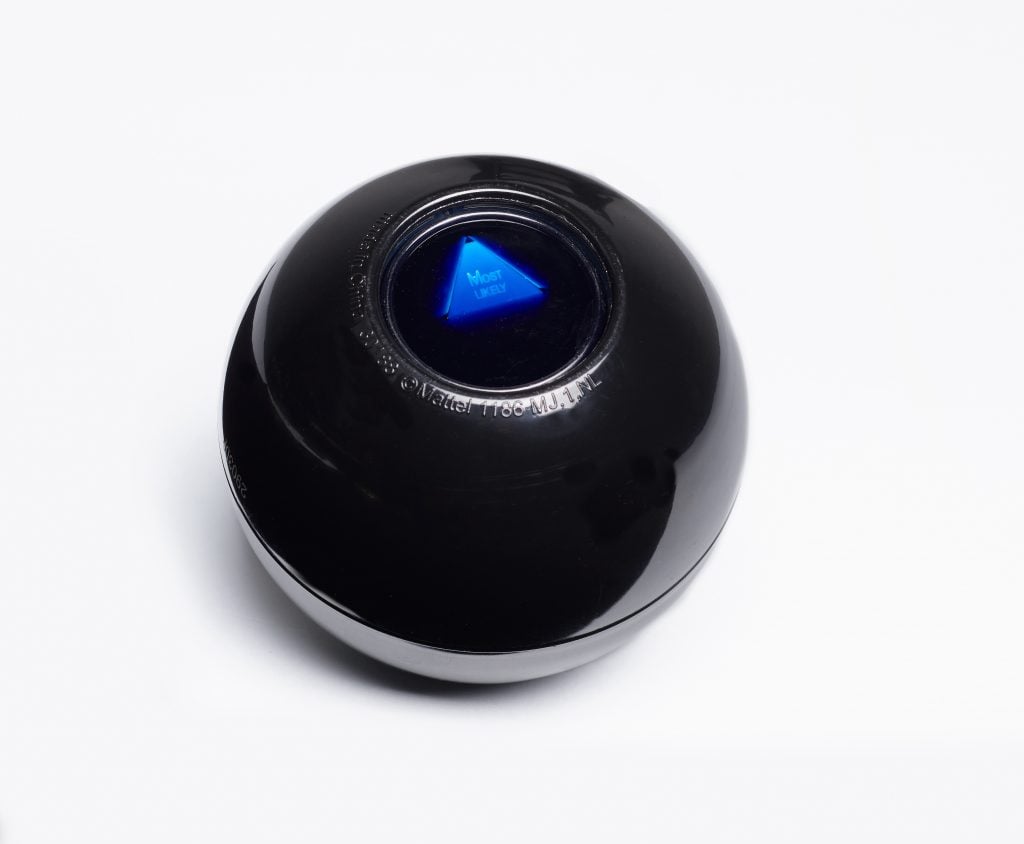 A black ball with a blue triangle in the middle