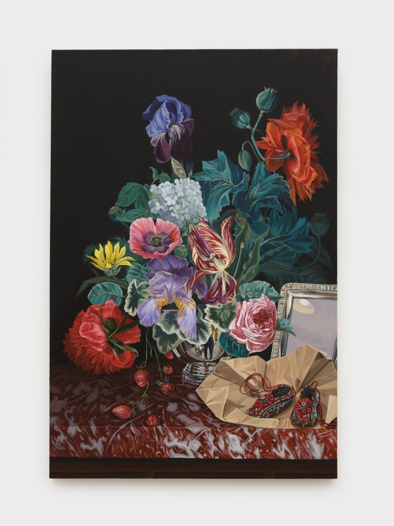 a still life with luscious flowers on a red marble slab