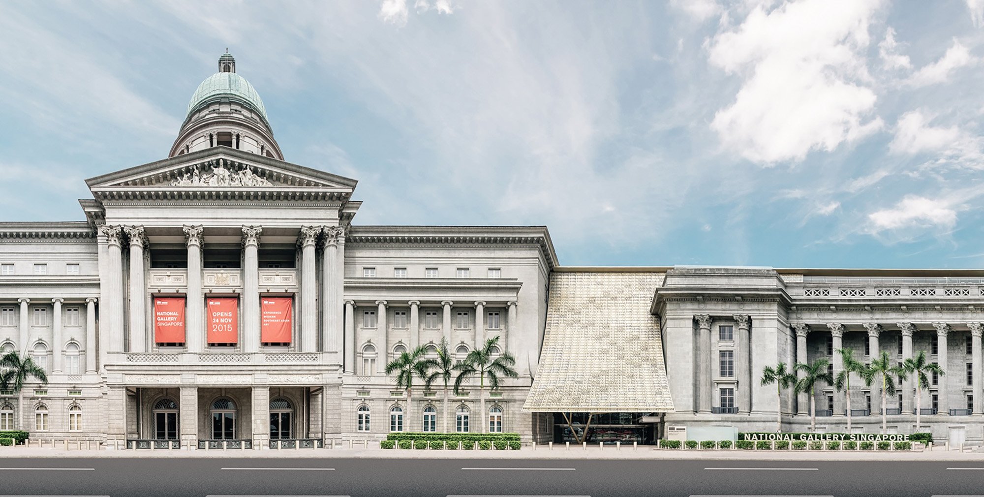 The facade of the National Gallery Singapore showing a grand colonial building upgraded with contemporary flair