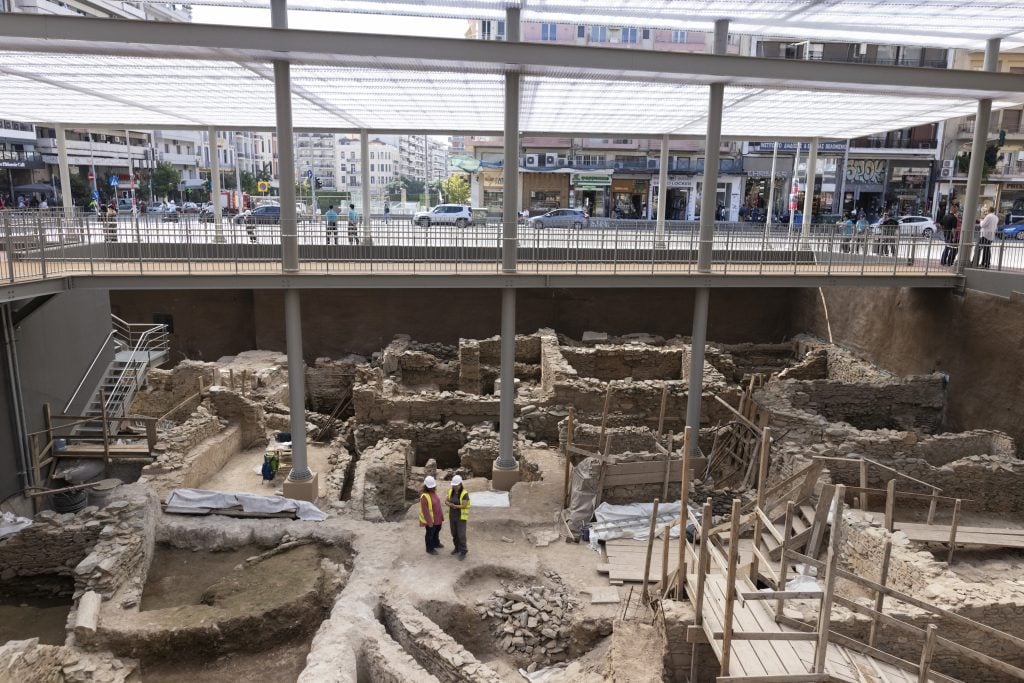 view of an ancient ruin inside a train station