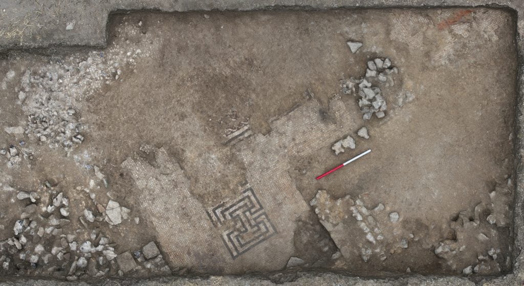 An aerial view of an excavated Roman villa including mosaic.