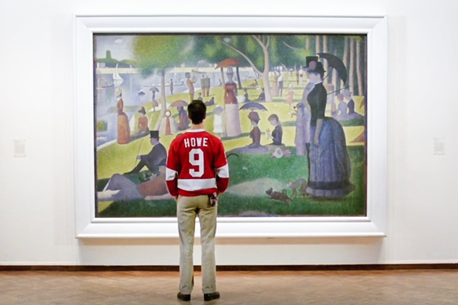 An image of Alan Ruck as Cameron Frye in Ferris Bueller's Day Off looking at Seurat's A Sunday Afternoon on the Island of La Grande Jatte.