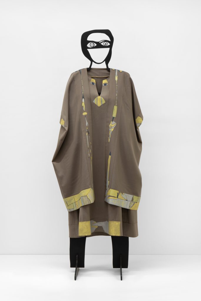 Drapey, tunic dress by Huguette Caland on a metal dress stand.