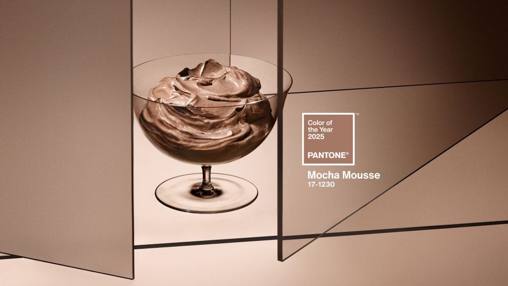 a bowl of mousse on a brown background