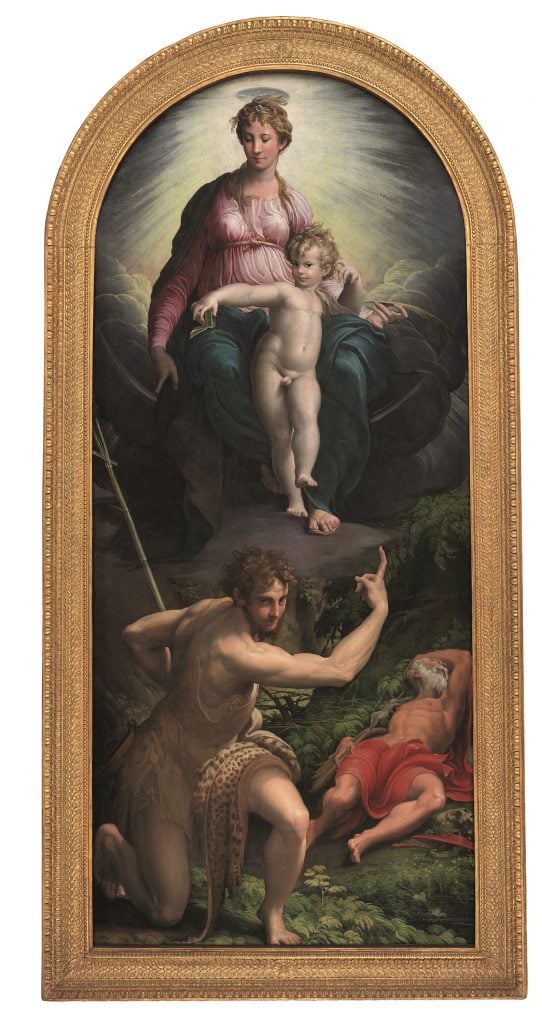 Parmigianino altarpiece showing the Madonna and Child rising above Saints John who is pointing upward and Saint Jerome who is sleeping