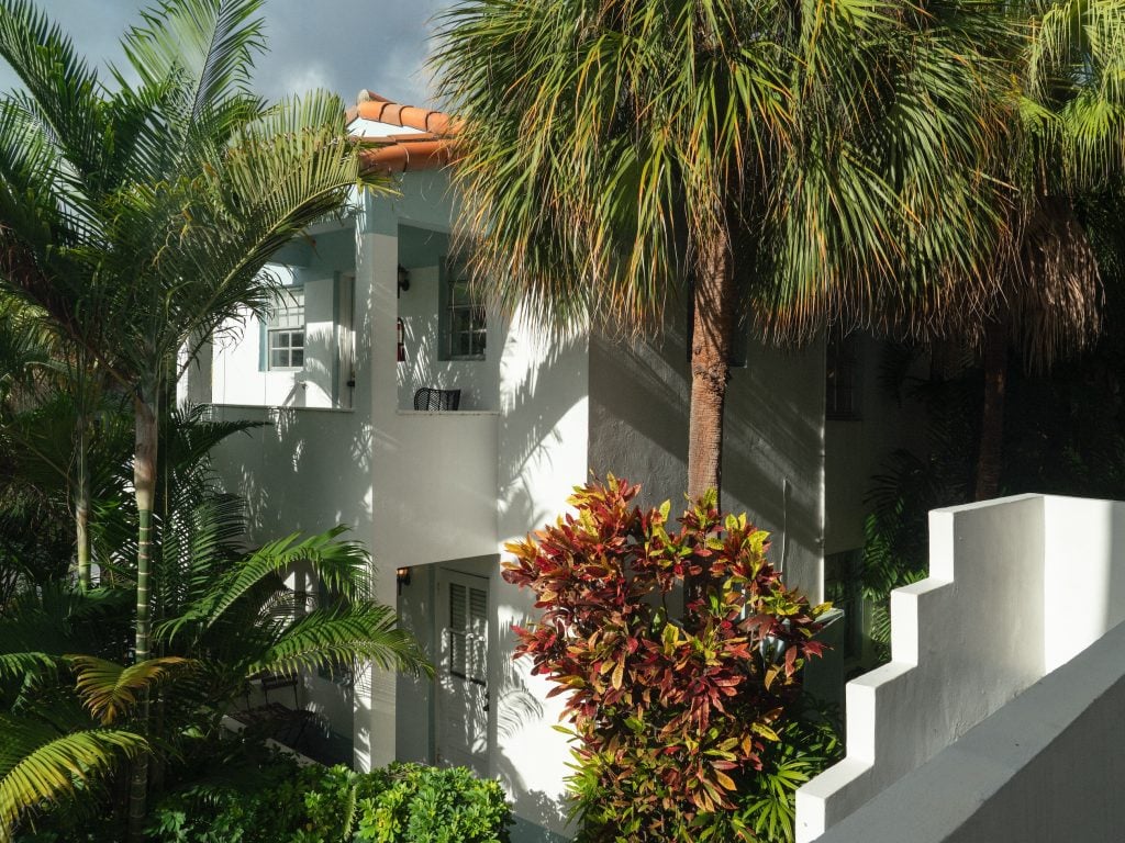 A bungalow tucked away among palm trees at Miami's River Inn