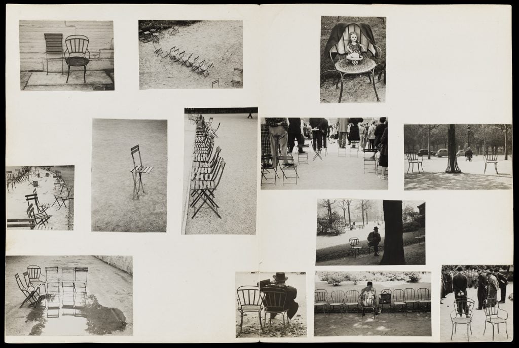 Thirteen black and white photos of daily life in Paris tessellated across two pages.