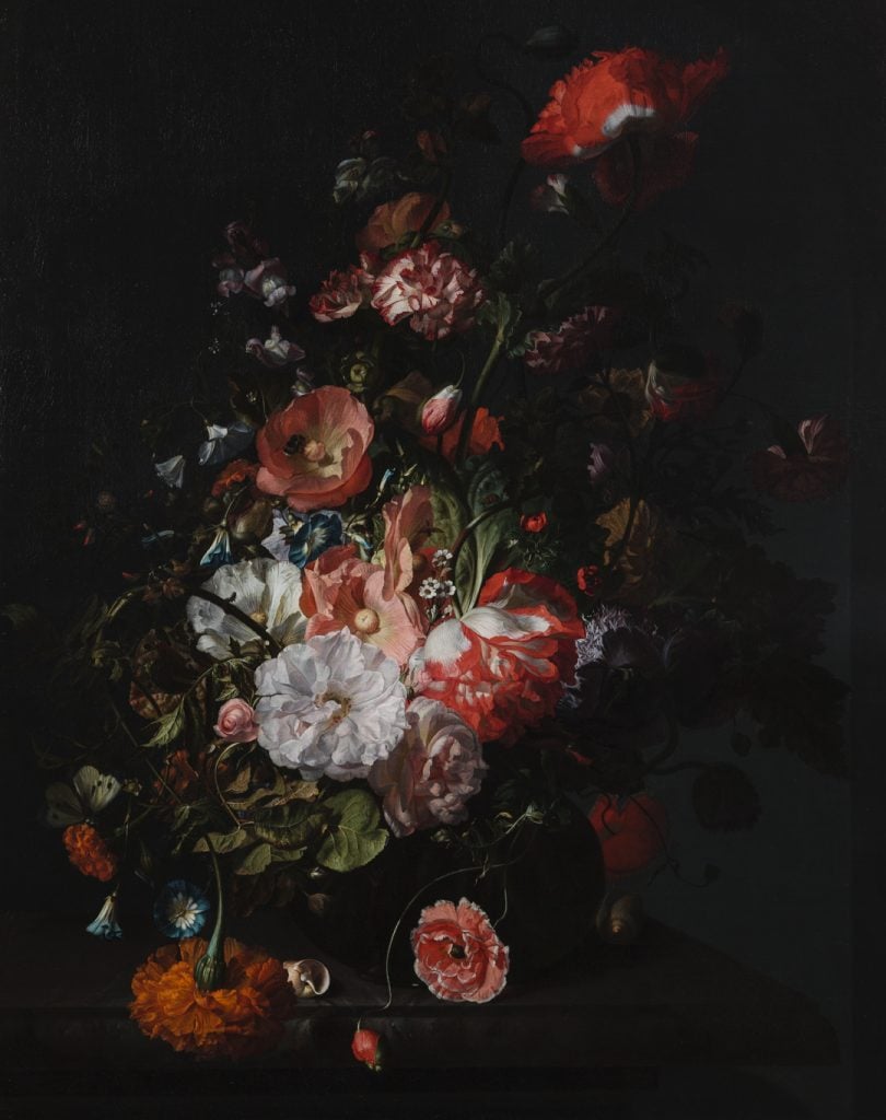 a still life of a riotous arrangement of flowers