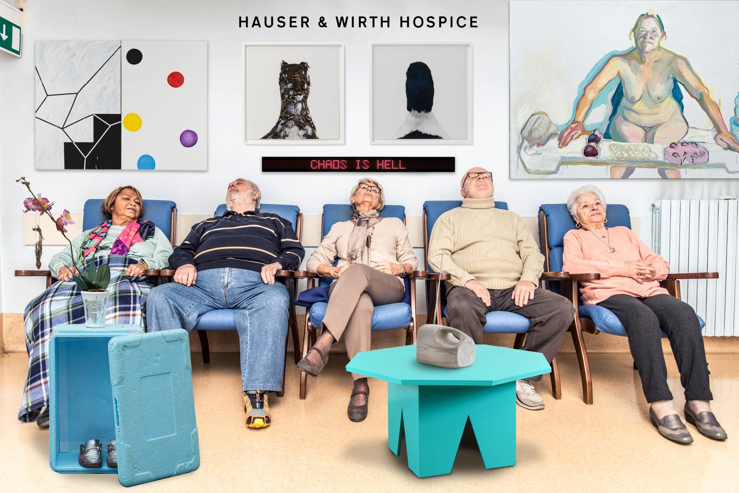 Five elderly people recline in an art-filled room