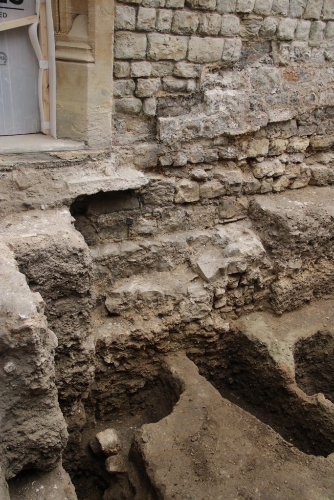 a view of steps next to a wall
