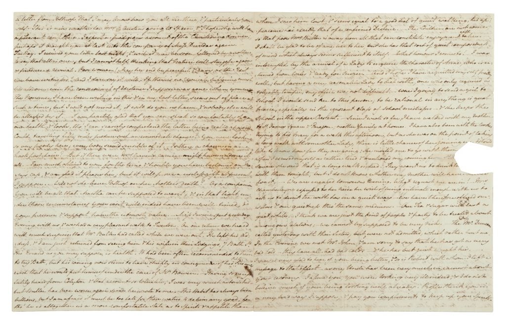 a piece of old paper with handwriting across it in black ink