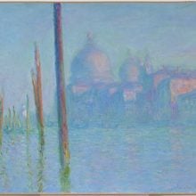 A painting of Venice’s Grand Canal in hazy blue light, with tall poles rising from the water and domed buildings faintly visible in the distance.