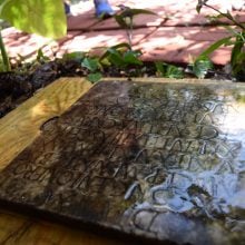 A 2,000-year-old roman tombstone laying on a table