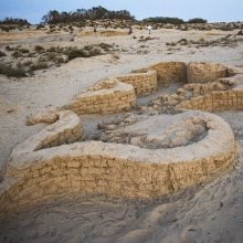 image of an ancient wall through the desert