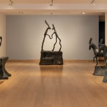 Installation view of Barry Flanagan: Two by Two (2025) at Waddington Custot, featuring bronze hare and horse sculptures displayed in a minimalist gallery space.