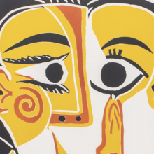 Detail of an abstract cubist portrait with bright yellow, orange, and black geometric shapes forming a stylized face, framed in gold with white matting.