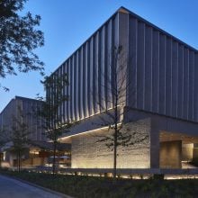 A photograph shows the Princeton University Art Museum at dusk.