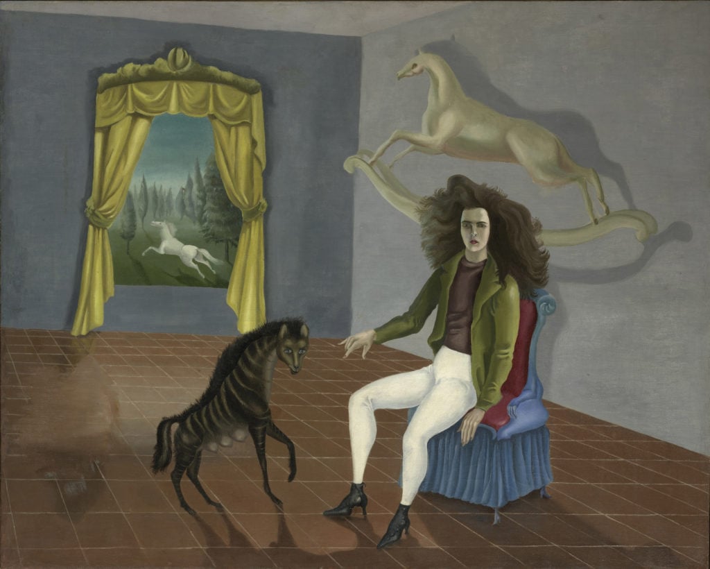This Leonora Carrington self-portrait shows the wild-haired artist in an empty room, reaching out to a hyena