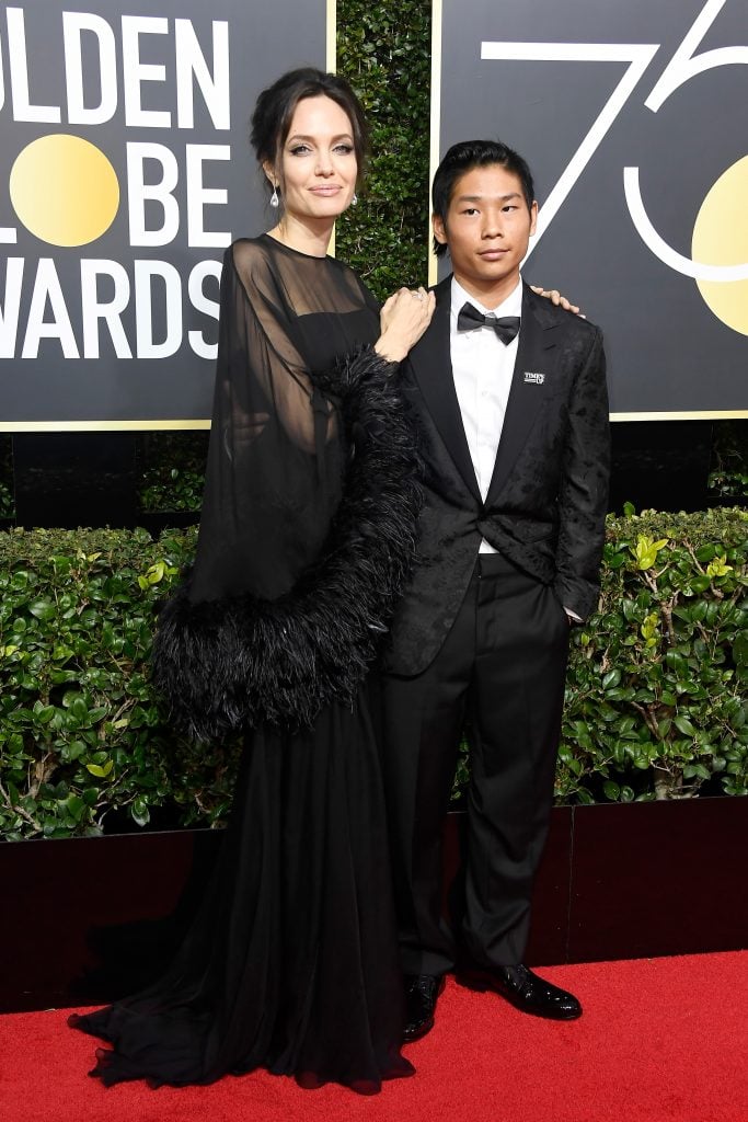 Actor/director Angelina Jolie and Pax Thien Jolie-Pitt attend The 75th Annual Golden Globe Awards at The Beverly Hilton Hotel on January 7, 2018 in Beverly Hills, California. Photo by Frazer Harrison/Getty Images.