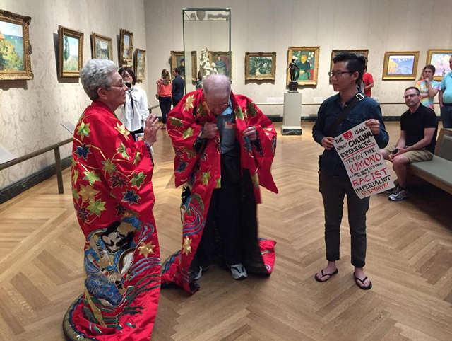 A protester at the Museum of Fine Arts Boston.Photo via Amber Ying, Twitter.