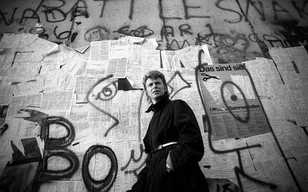 David Bowie at the Berlin Wall, (1987). Photo: Denis O'Regan/Getty Images.